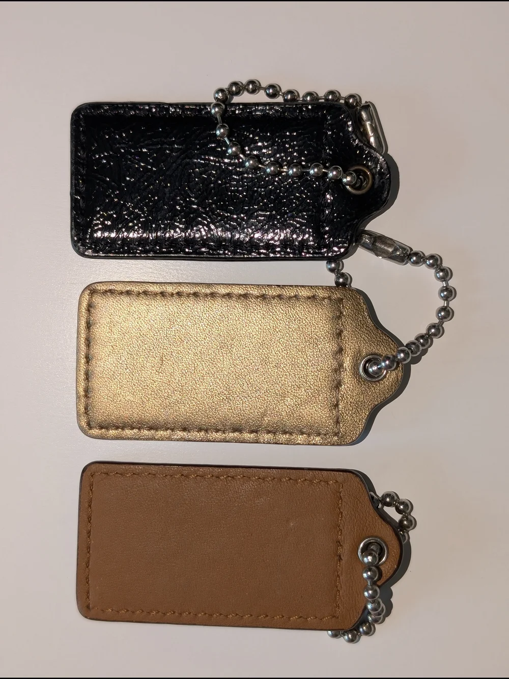 Coach Leather Hangtag Trio - Black, Gold, Brown